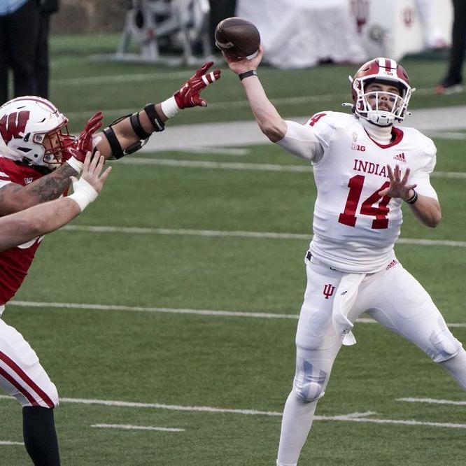 Indiana's Jack Tuttle throws a pass